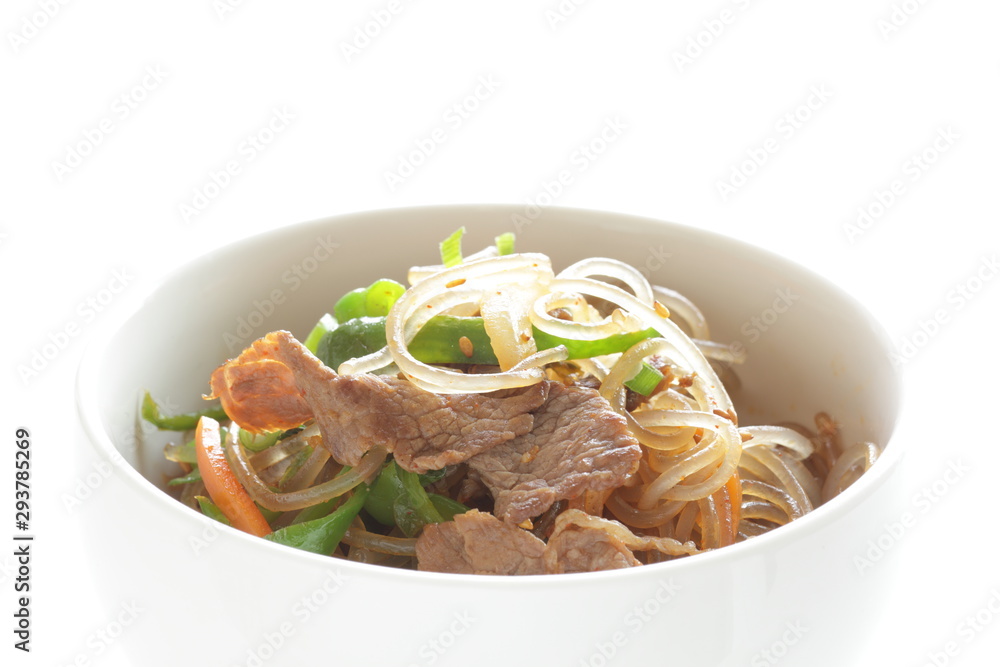 Korean food, glass noodles and beef stir fried with vegetable Korean food, glass noodles and beef stir fried with vegetable