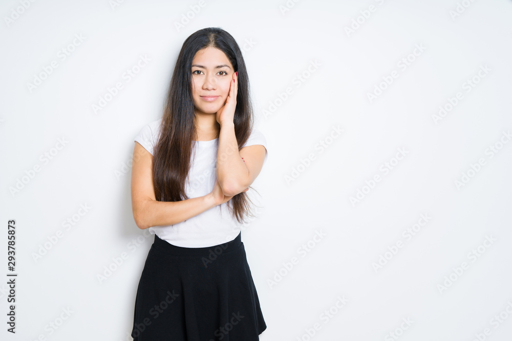 Beautiful brunette woman over isolated background thinking looking tired and bored with depression problems with crossed arms. Beautiful brunette woman over isolated background thinking looking tired and bored with depression problems with crossed arms.