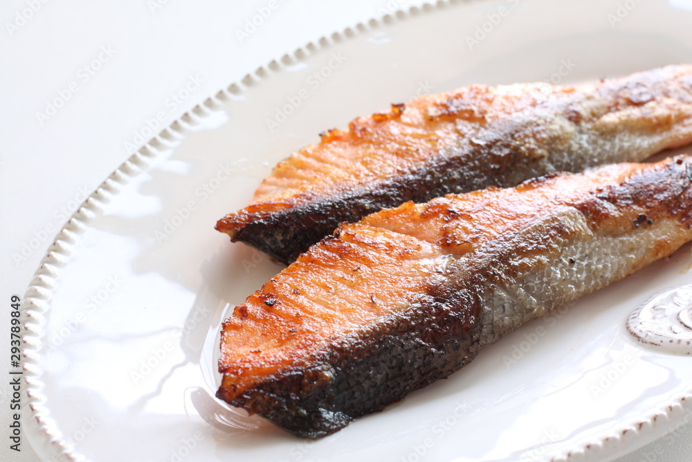 Pan fried salmon fillet fish on dish Pan fried salmon fillet fish on dish