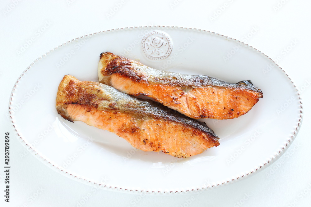 Pan fried salmon fillet fish on dish