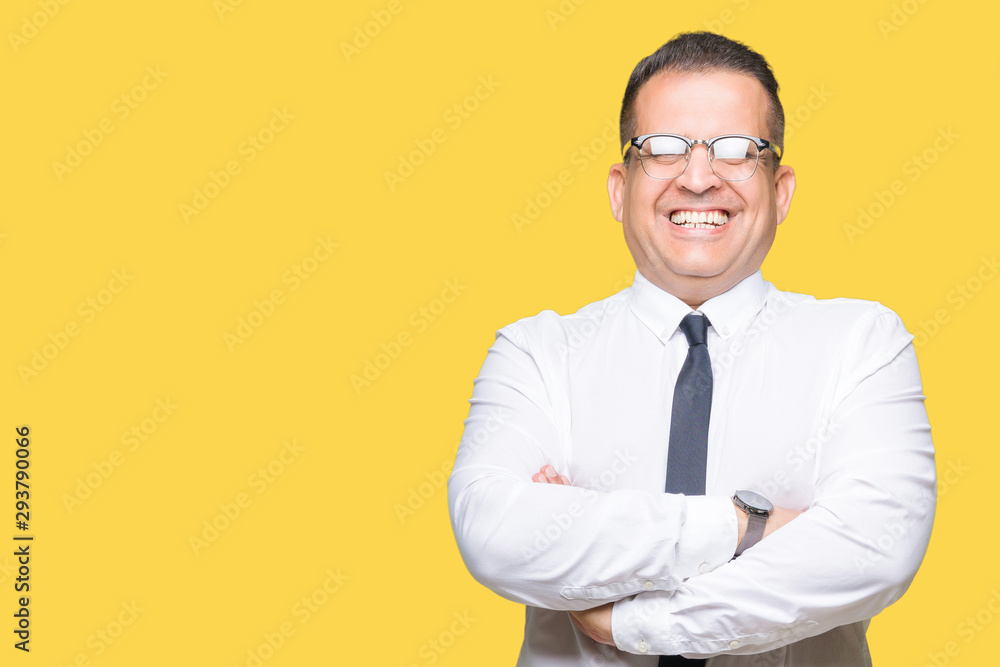 Middle age bussines arab man wearing glasses over isolated background happy face smiling with crossed arms looking at the camera. Positive person. Middle age bussines arab man wearing glasses over isolated background happy face smiling with crossed arms looking at the camera. Positive person.