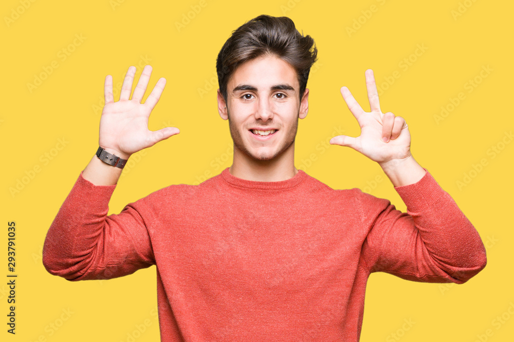 Young handsome man over isolated background showing and pointing up with fingers number eight while smiling confident and happy. Young handsome man over isolated background showing and pointing up with fingers number eight while smiling confident and happy.