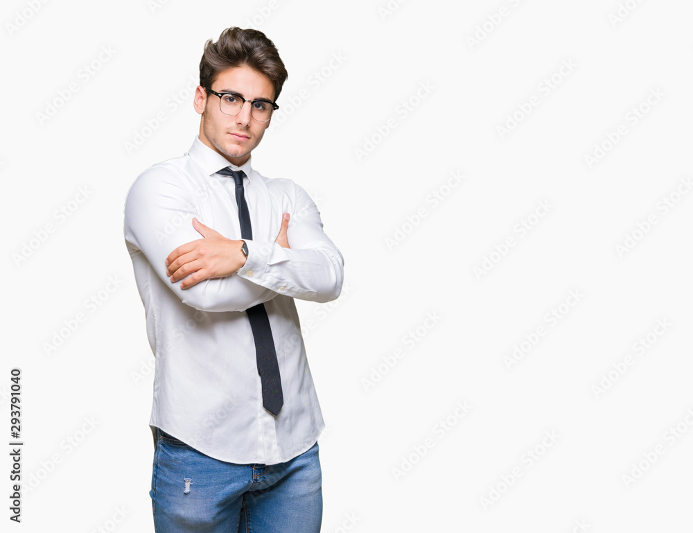 Young business man wearing glasses over isolated background smiling looking to the side with arms crossed convinced and confident Young business man wearing glasses over isolated background smiling looking to the side with arms crossed convinced and confident