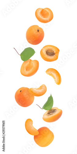 Collage of falling fresh ripe apricots on white background