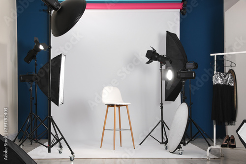 Photo studio interior with set of professional equipment