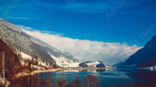 Beautiful winter scenery in the Alps with snowy mountain
