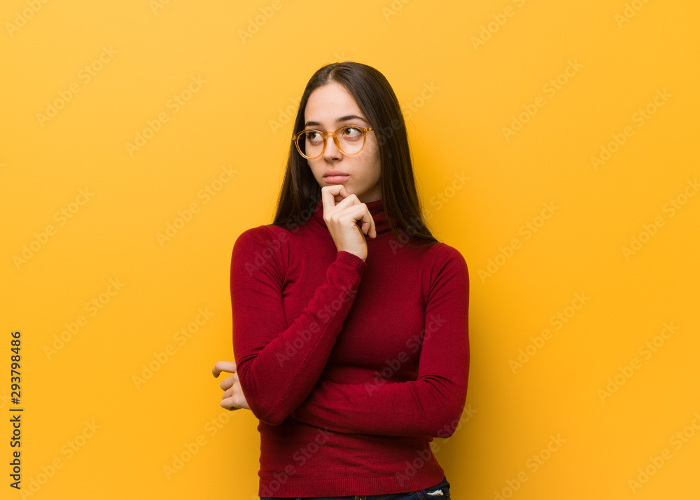 Intellectual young girl thinking about an idea