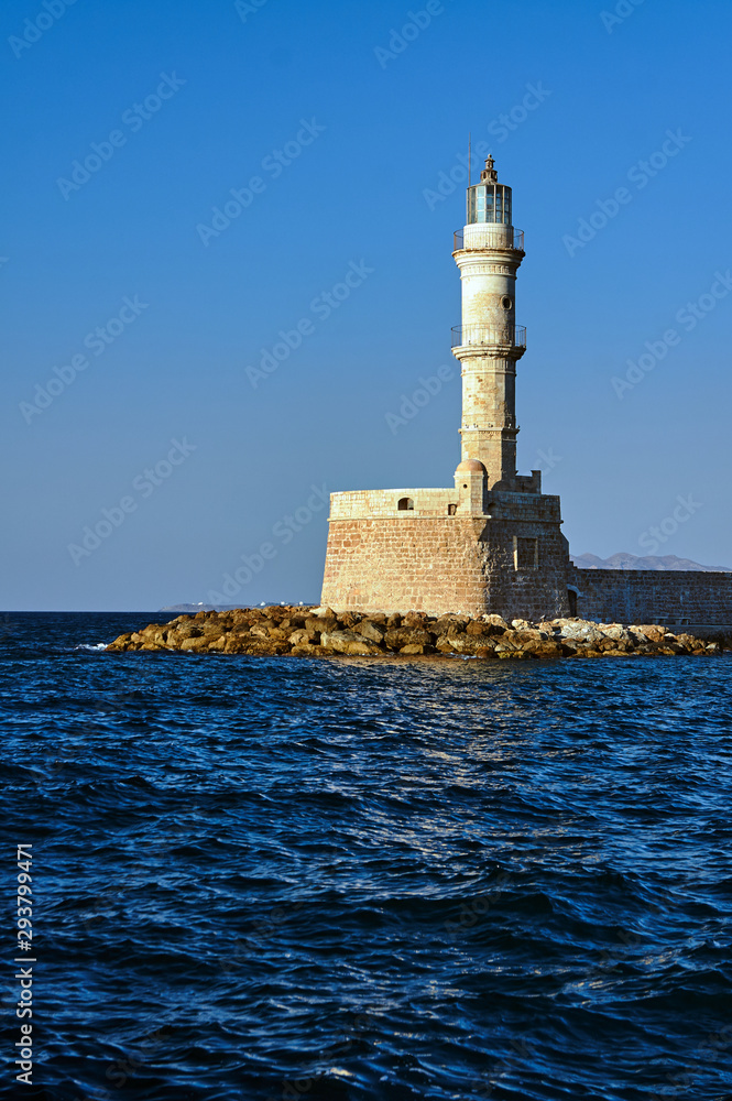 Historic Lighthouse in the old port in the evening, Chania, Crete.
