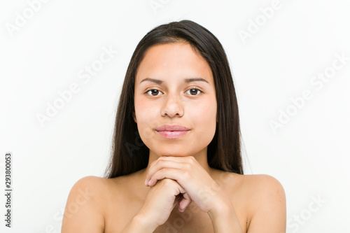 Close up of a beautiful and natural hispanic young woman