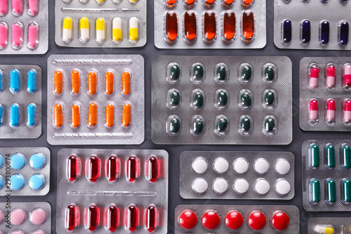 Fotografie, Tablou Flat lay composition with bunch of different colorful pills in blister packs