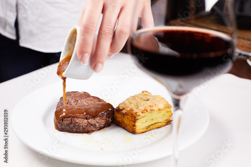 steak with knife and fork on plate