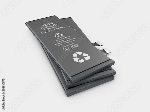 Rechargeable cell phone batteries. Isolated on gray background.