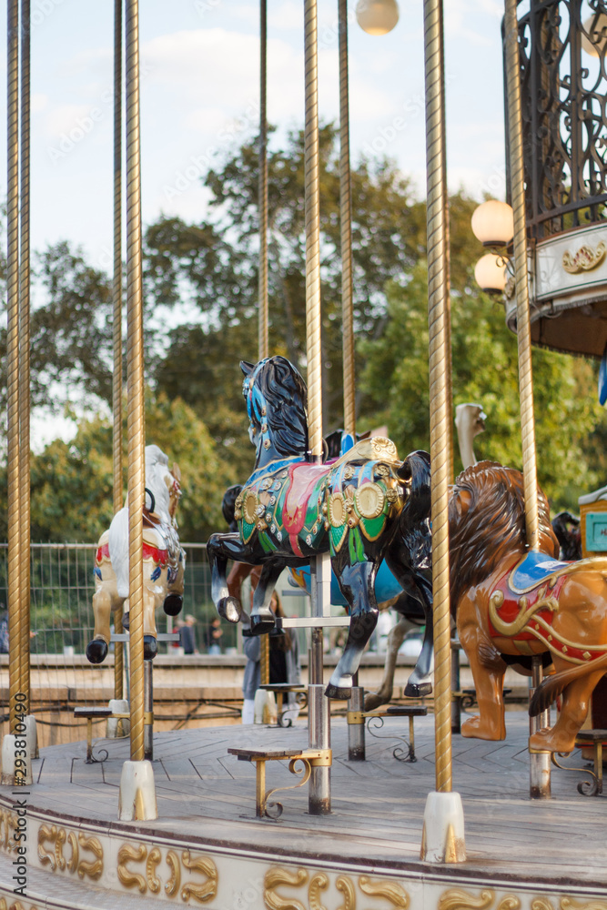 Fototapeta premium Eiffel tower near the amusement Park in Paris in France September 2019