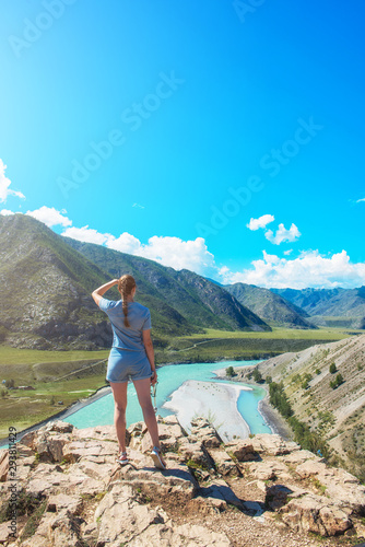 Woman taking selfie on mobi...