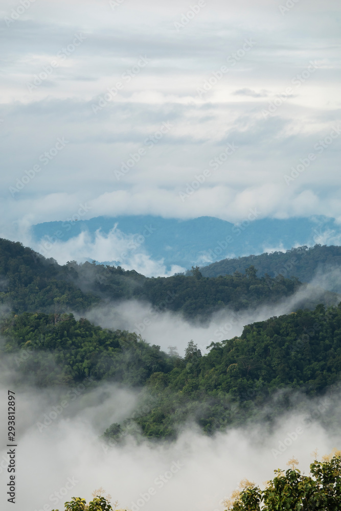 view of mountains and clouds