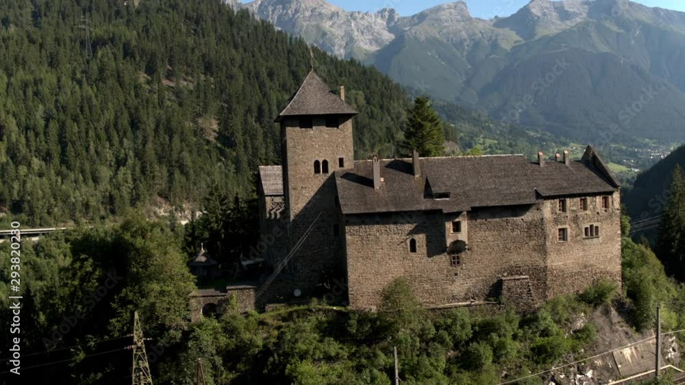 alpine castle schloss wiesberg with parseier mountain and railway track alpine castle schloss wiesberg with parseier mountain and railway track