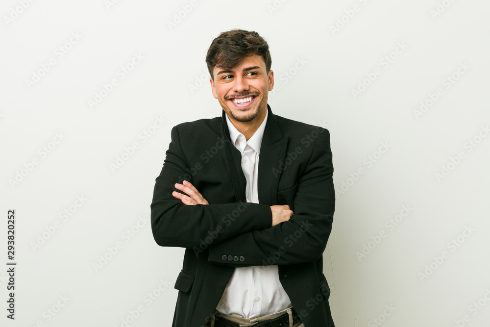 Young business hispanic man smiling confident with crossed arms. Young business hispanic man smiling confident with crossed arms.