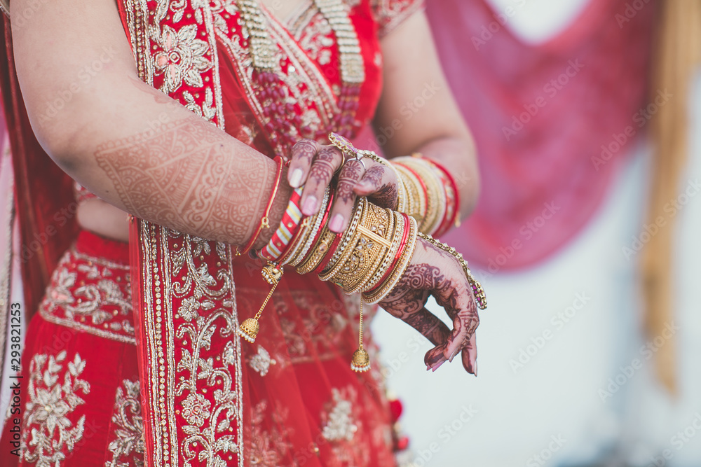 Indian hindu bride's wearing her wedding jewellery close up