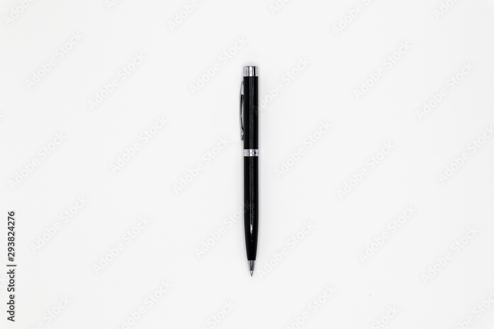close up of black pen on white background close up of black pen on white background