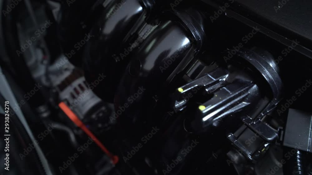 Closeup detailed view of new car engine compartment, Dolly shot Closeup detailed view of new car engine compartment, Dolly shot
