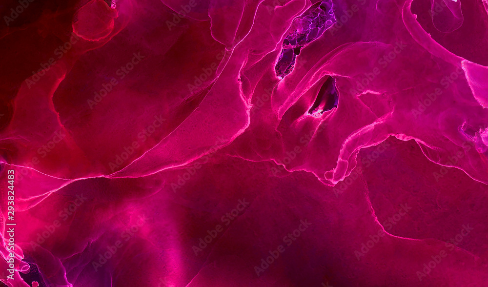 Bright pink alcohol ink neon abstract on black paper background. Flow liquid watercolor paint