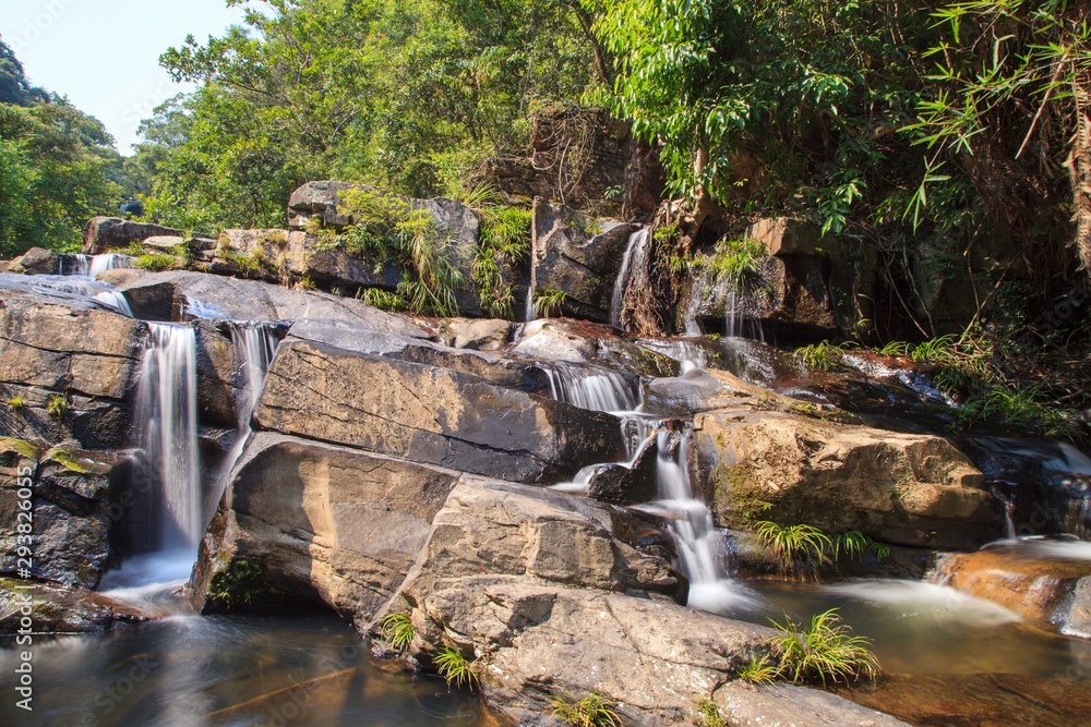 Naklejka premium waterfall in deep forest 2