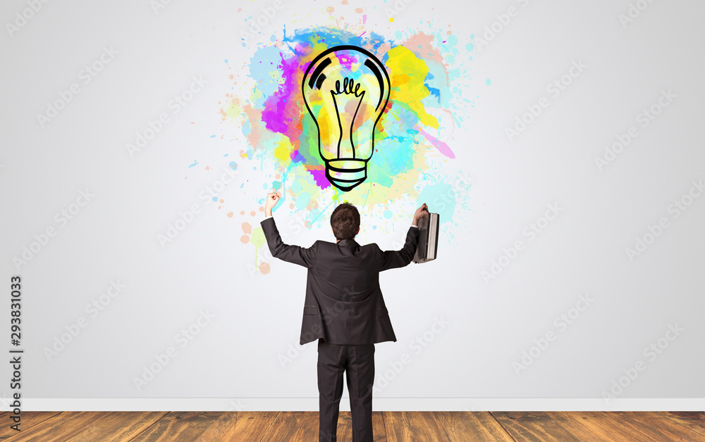 Businessman looking to a wall with new idea concept Businessman looking to a wall with new idea concept