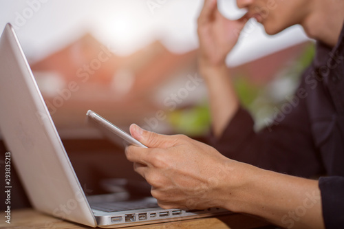 woman using tablet computer at home