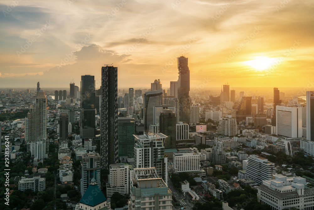Bangkok, Thailand in Downtown area skyline view during sunset time from rooftop in Bangkok. Asian tourism, modern city life, or business finance and economy concept.