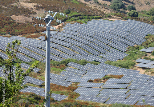 Photos many solar panels on the hill