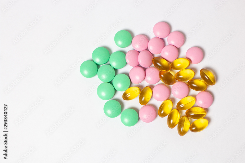 colorful pills on white background colorful pills on white background