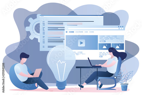 Male and female programmers with laptops at workplace,front-end and back-end development.