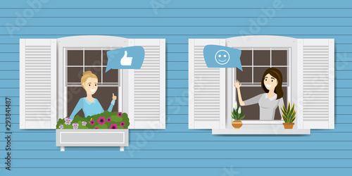 The outer wall of the house with windows. Happy women look out of windows and talk