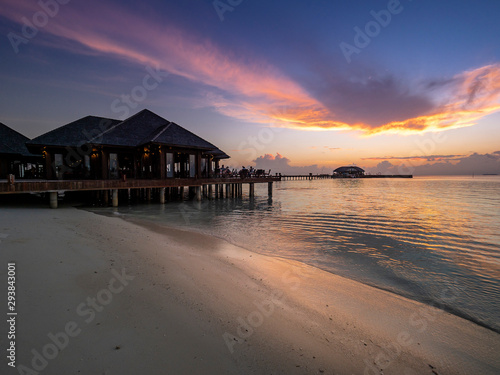 Sunset on the beach of a Maldives island. South Male Atoll, Maldives, April 2019