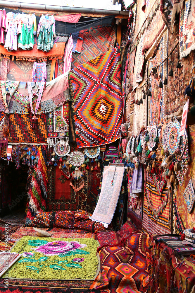  Traditional colorful rugs and carpets are decorated orientally in a carpet store in Cappadocia Turkey.