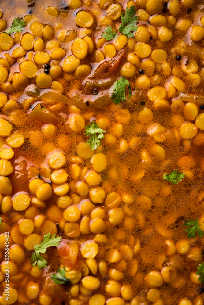 Chana Dal fry or Split Bengal Gram tadka served in a bowl or pan, selective focus Chana Dal fry or Split Bengal Gram tadka served in a bowl or pan, selective focus