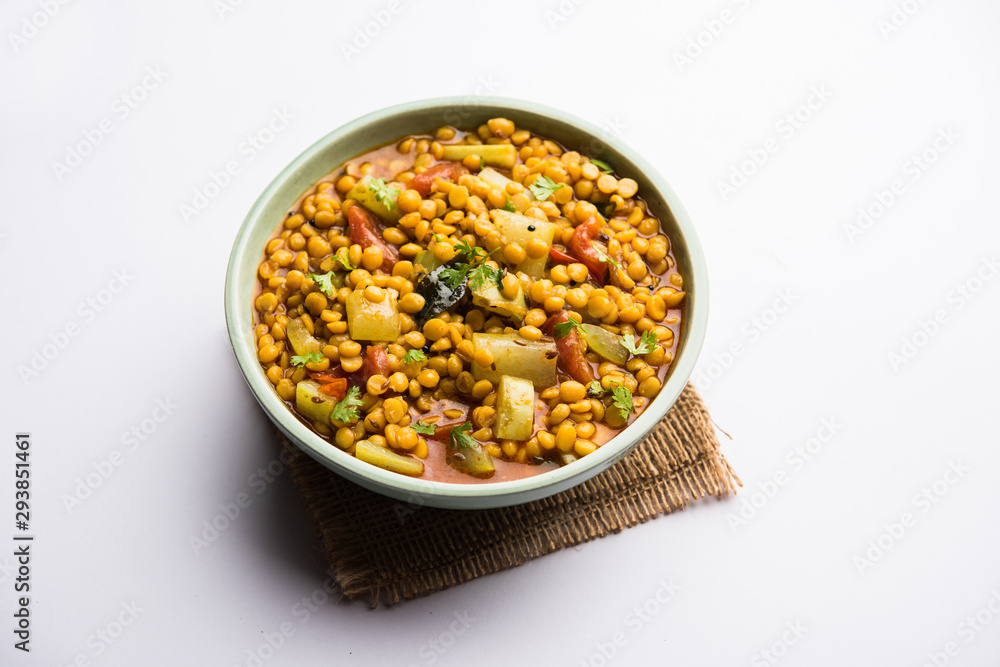 Lauki / Doodhi Chana Dal Subji or Bottlegourd Gram Curry, served in a bowl.selective focus Lauki / Doodhi Chana Dal Subji or Bottlegourd Gram Curry, served in a bowl.selective focus