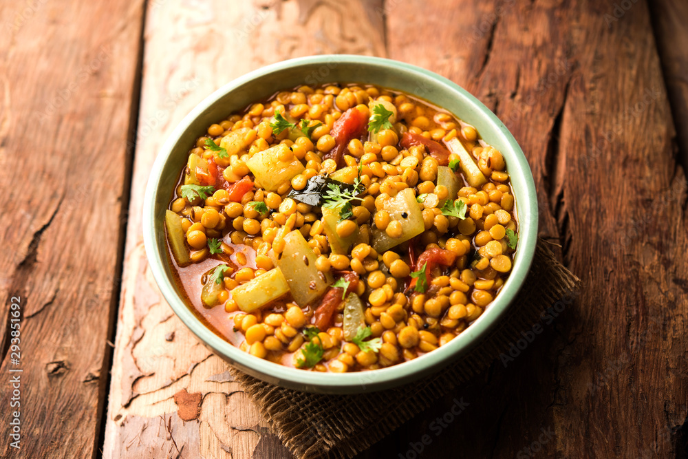 Lauki / Doodhi Chana Dal Subji or Bottlegourd Gram Curry, served in a bowl.selective focus Lauki / Doodhi Chana Dal Subji or Bottlegourd Gram Curry, served in a bowl.selective focus