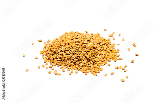 Fenugreek seeds in isolated white background.