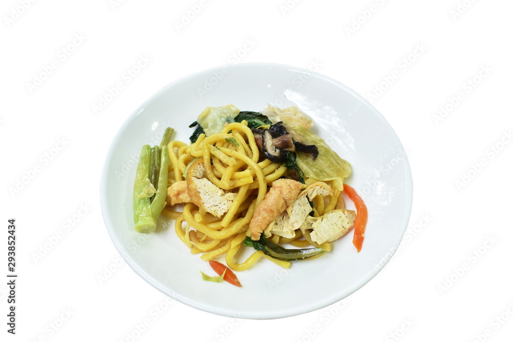 stir fried yellow noodles with cabbage and tofu vegetarian food on dish stir fried yellow noodles with cabbage and tofu vegetarian food on dish