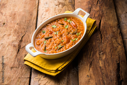 Red Lentil Cooked Dal or Dhal or Masoor daal tadka, selective focus