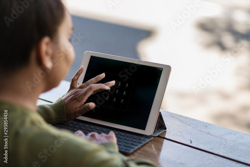 woman using ipad photo