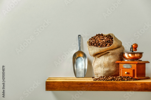 Billede på lærred Fresh coffee on wooden shelf and free space for your decoration.