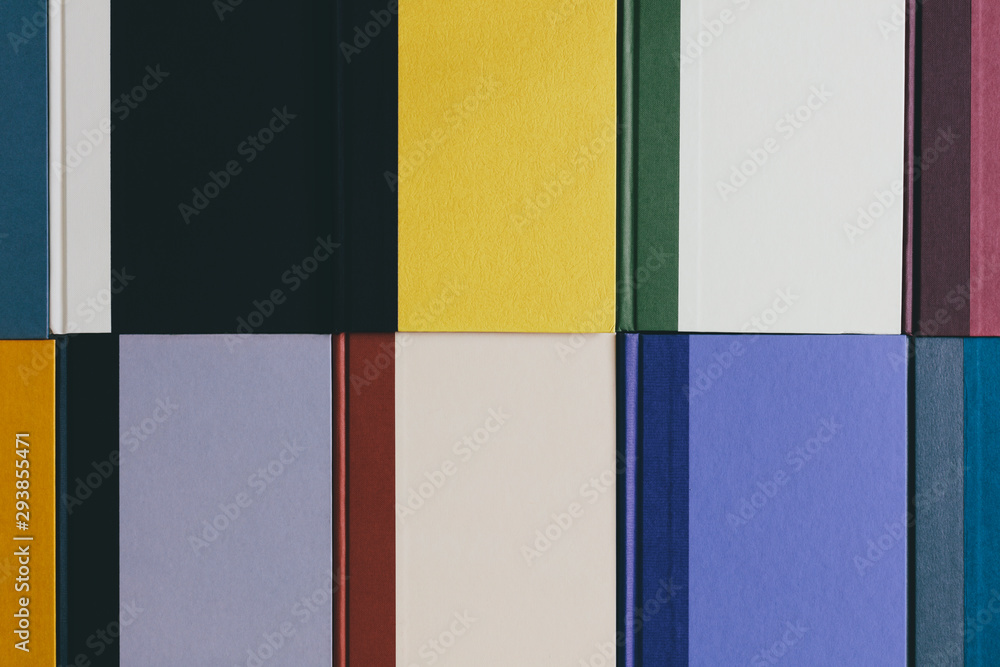 Arrangement of multicolored hardback books Arrangement of multicolored hardback books