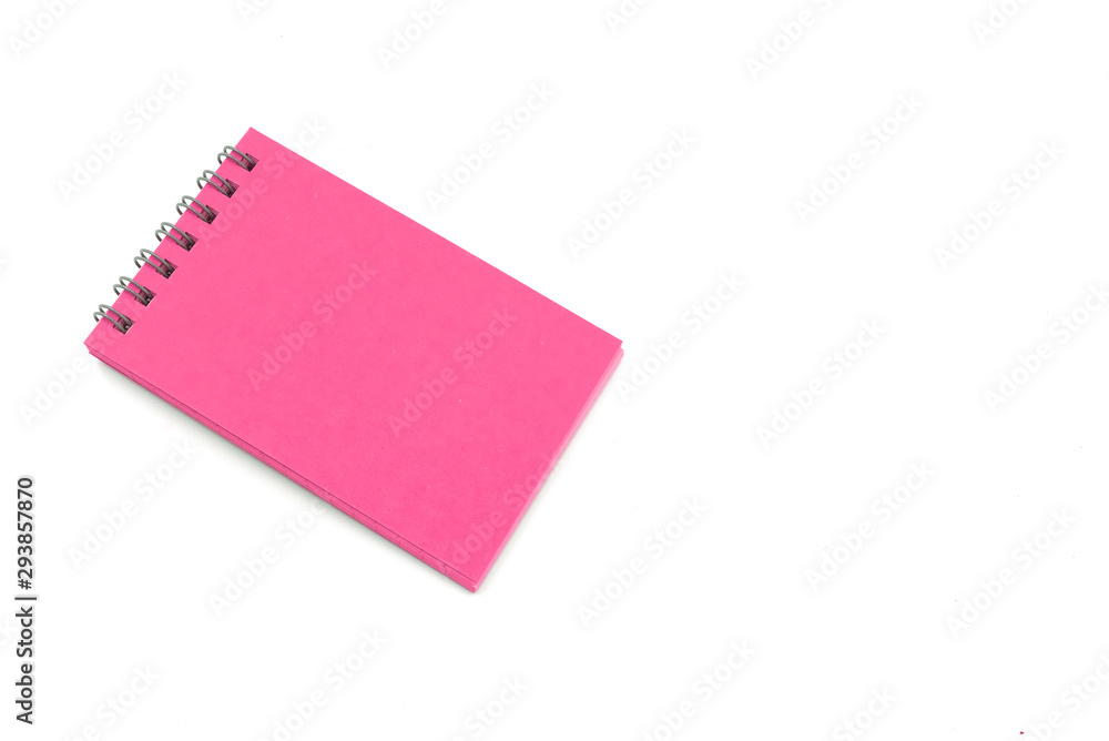 pink small paper note book isolated on white background with copy space pink small paper note book isolated on white background with copy space