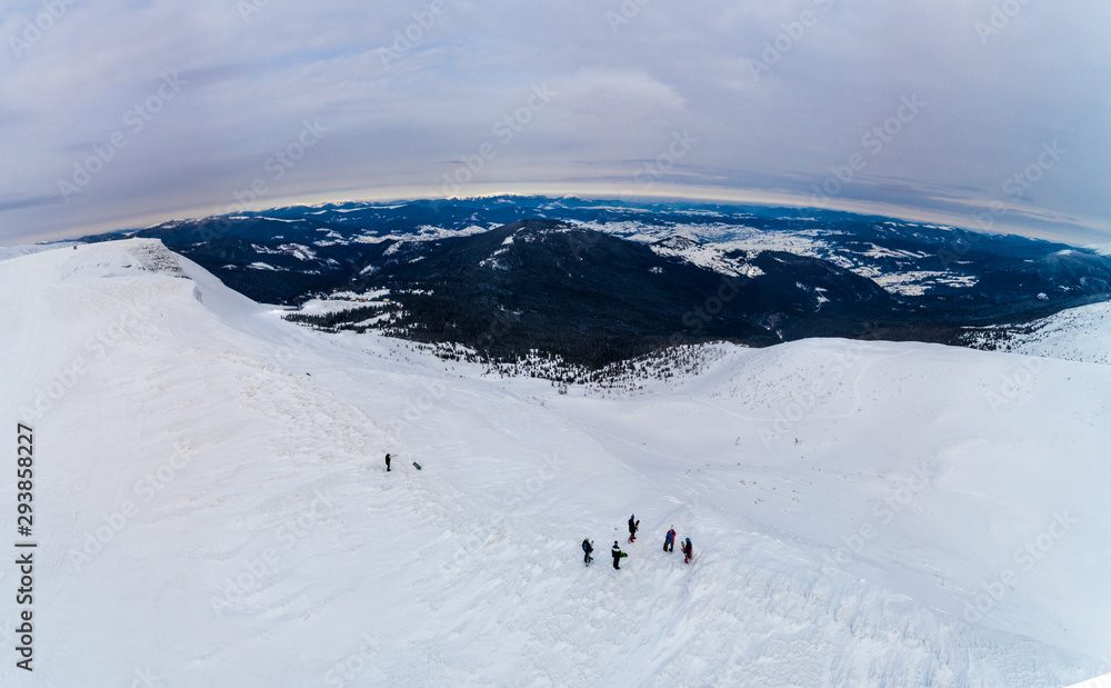 Amazing aerial view of a hill with skiers Amazing aerial view of a hill with skiers
