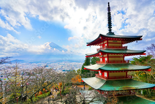 View of the Japanese temple in autumn with Mount Fuji in the background in Japan.