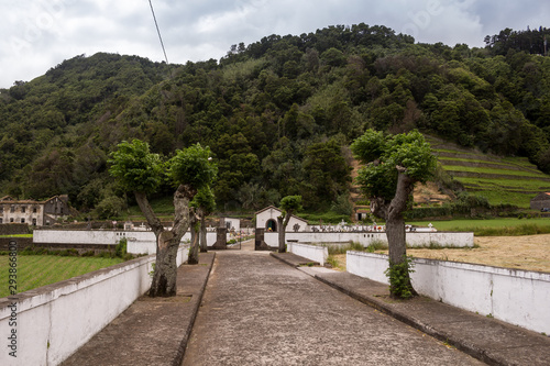 Road to the cemetery under a hill