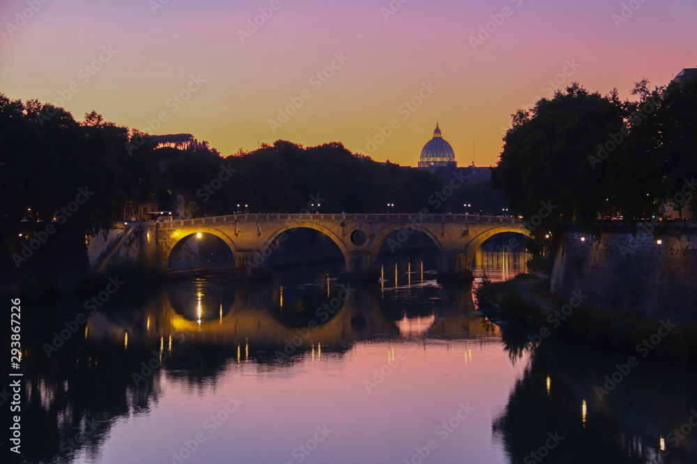 Rome, Italy at Sunset with the sint Peters Cathedral on the background