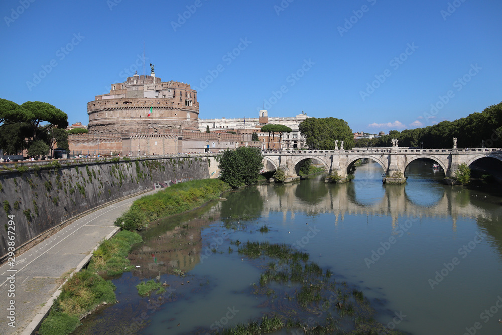 Mausoleum Castel Sant Angelo and bridge reflecting on the water surface